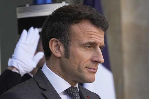 French President Emmanuel Macron waits for Chad&#039;s President Mahamat Idriss Deby Monday, Feb. 6, 2023 at the Elysee Palace in Paris. French President Emmanuel Macron&#039;s unpopular planned pensi ...