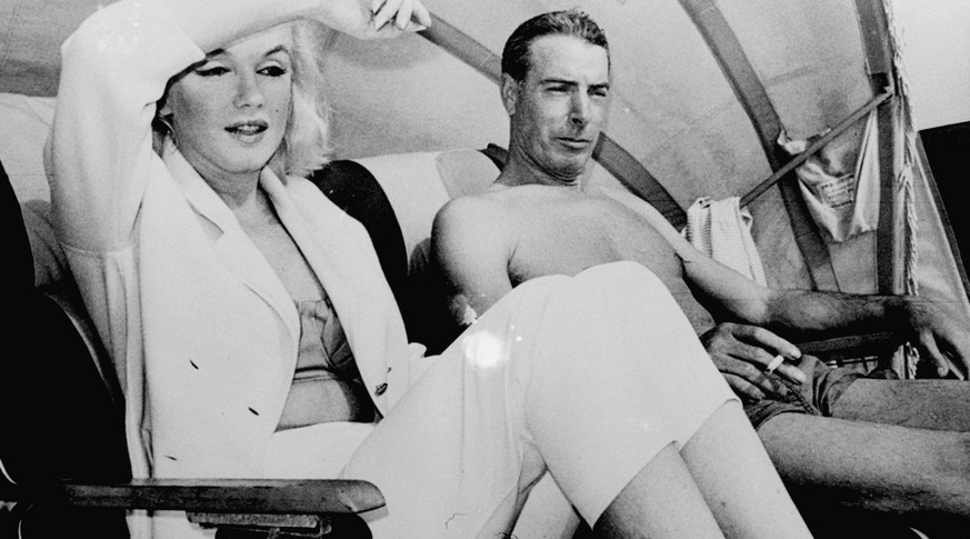 Marilyn Monroe and Joe DiMaggio are pictured together in a cabana on Redington Beach near St. Petersburg, Florida, on March 22, 1961. (AP Photo)