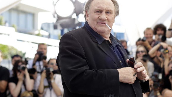 FILE - Actor Gerard Depardieu poses for photographers during a photo call for the film Valley of Love, at the 68th international film festival, Cannes, southern France, on May 22, 2015. A lawyer has f ...