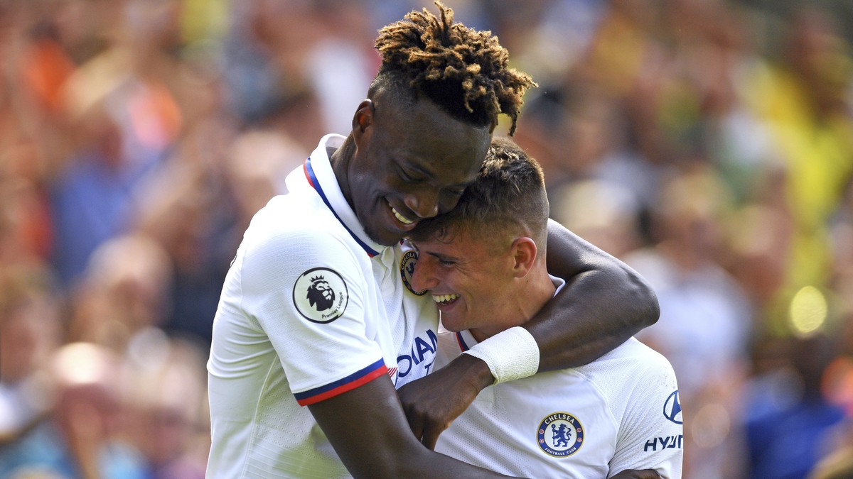 Chelsea's Mason Mount, right, celebrates scoring his side's second goal of the game with Tammy Abraham during the English Premier League soccer match between Norwich City and Chelsea at the  ...