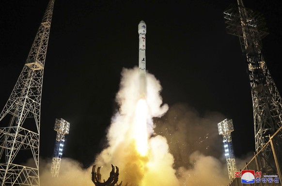 FILE - This photo provided by the North Korean government shows what the country said is the launch of the Malligyong-1, a military spy satellite, into orbit on Nov. 21, 2023. Independent journalists  ...