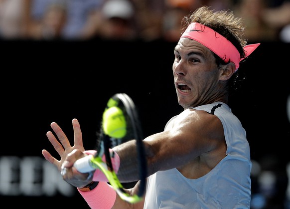 Spain&#039;s Rafael Nadal makes a forehand return to Argentina&#039;s Diego Schwartzman during their fourth round match at the Australian Open tennis championships in Melbourne, Australia Sunday, Jan. ...