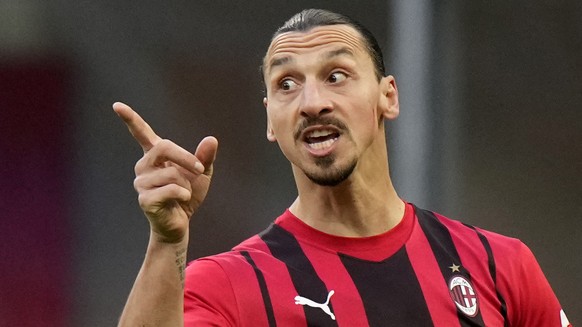 AC Milan's Zlatan Ibrahimovic gestures during a Serie A soccer match between AC Milan and Sassuolo, at the San Siro stadium in Milan, Italy, Sunday, Nov. 28, 2021. (AP Photo/Luca Bruno)