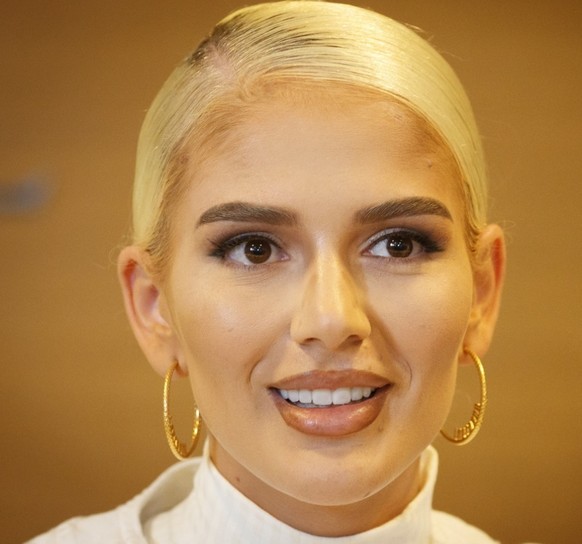 epa07560680 Albanian-Swiss rapper Loredana Zefi speaks to media during a press conference in Pristina, Kosovo, 10 May 2019. Zefi is accused to have cheated a Swiss couple by 700,000 Swiss francs (615, ...