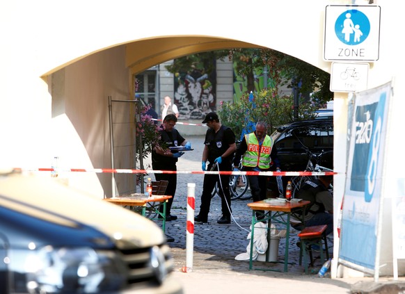 Police secure the area after an explosion in Ansbach, Germany, July 25, 2016. REUTERS/Michaela Rehle