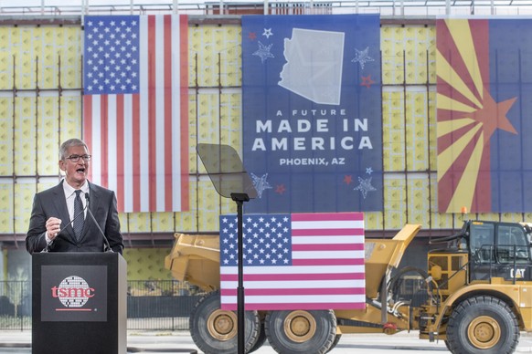 epa10353076 Apple CEO Time Cook delivers remarks before the appearance of US President Joe Biden at Taiwan Semiconductor Manufacturing Company (TSMC) in Phoenix, Arizona, USA, 06 December 2022. Biden  ...