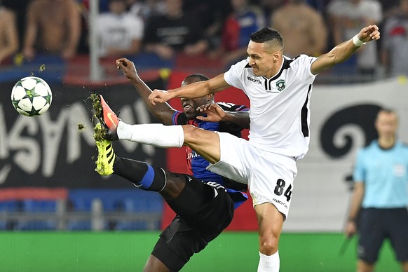 Basel&#039;s Eder Balanta, left, fights for the ball against Ludogorets&#039; Marcelinho during an UEFA Champions League Group stage Group A matchday 1 soccer match between Switzerland&#039;s FC Basel ...