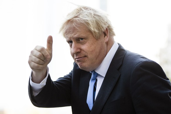 FILE - Britain&#039;s Prime Minister Boris Johnson gestures as he departs from Hudson Yards, in New York, Tuesday, Sept. 24, 2019. He was the mayor who reveled in the glory of hosting the 2012 London  ...