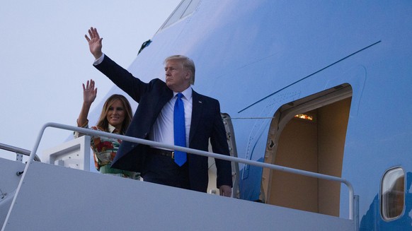 President Donald Trump, with first lady Melania Trump, wave as they board Air Force One as they depart Sunday, June 2, 2019, at Andrews Air Force Base, Md. Trump is going to London, France and Ireland ...