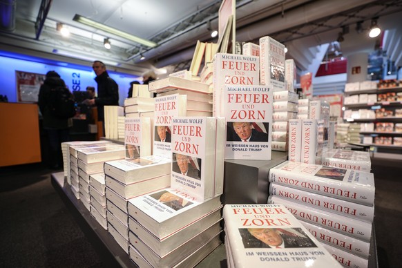 epa06531990 The German translation of US writer Michael Wolff&#039;s book &#039;Fire and Fury&#039;, titled &#039;Feuer und Zorn&#039;, about the Trump White House is now for sale at a bookstore in Fr ...