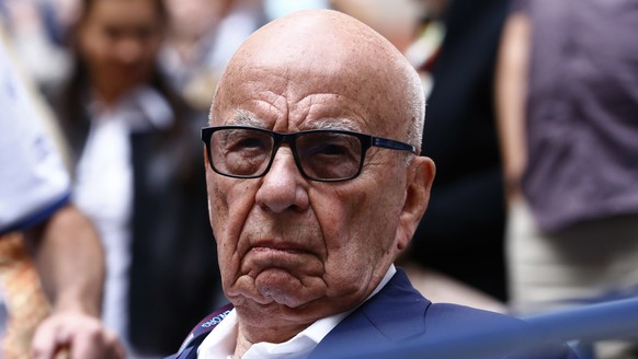 FILE- In this Sunday, Sept. 10, 2017 file photo, Rupert Murdoch waits for the start of the men&#039;s singles final of the U.S. Open tennis tournament in New York. Rupert Murdoch&#039;s British newspa ...