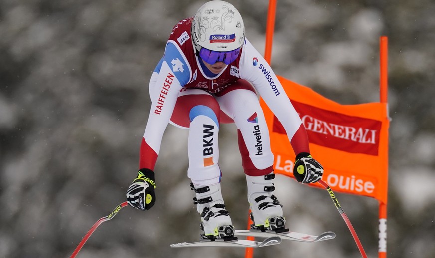 Corinne Suter, of Switzerland, skis down the course during the women&#039;s World Cup downhill ski race in Lake Louise, Alberta, Canada, on Saturday, Dec.7, 2019. (Frank Gunn/The Canadian Press via AP ...
