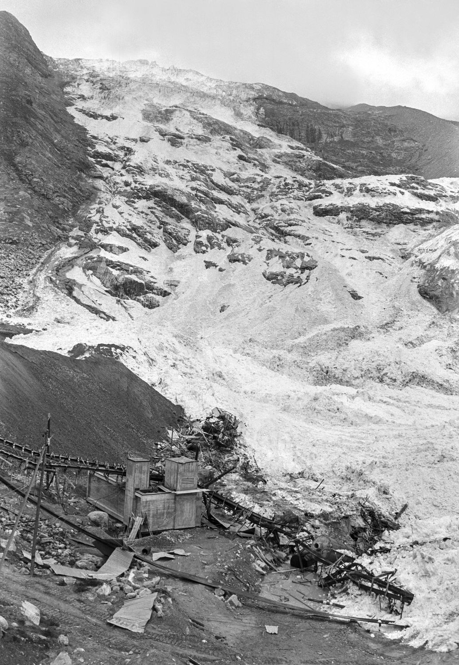 Aerial view of the destroyed hut camp of the Mattmark reservoir building site in the Canton of Valais, Switzerland, on August 31, 1965. On August 30, 1965, an ice avalanche from the Allalin Glacier de ...