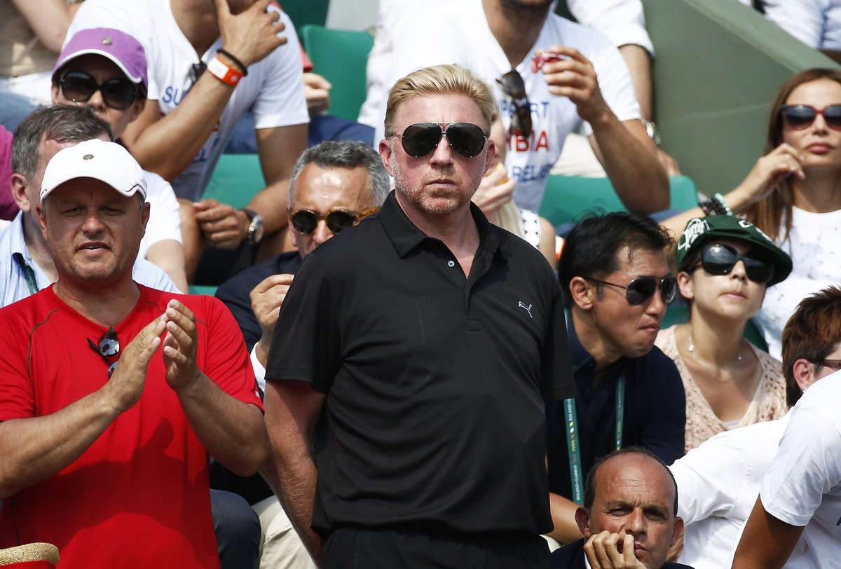 epa04245268 Coach Boris Becker follows the action between Novak Djokovic of Serbia and Rafael Nadal of Spain in the men's final of the French Open tennis tournament at Roland Garros in Paris, Fra ...