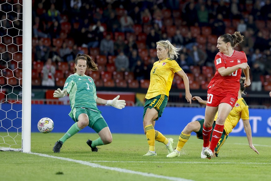 Switzerlands Fabienne Humm scores to the 2-1 against Wales&#039; goalkeeper Laura O&#039;Sullivan during the FIFA Women&#039;s World Cup 2023 qualifying round group G soccer match between the national ...