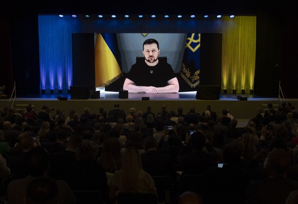 epa10051410 Ukrainian President Volodymyr Zelenskyy delivers a speech by video conference during the Ukraine Recovery Conference URC, in Lugano, Switzerland, 04 July 2022. The URC is organised to init ...