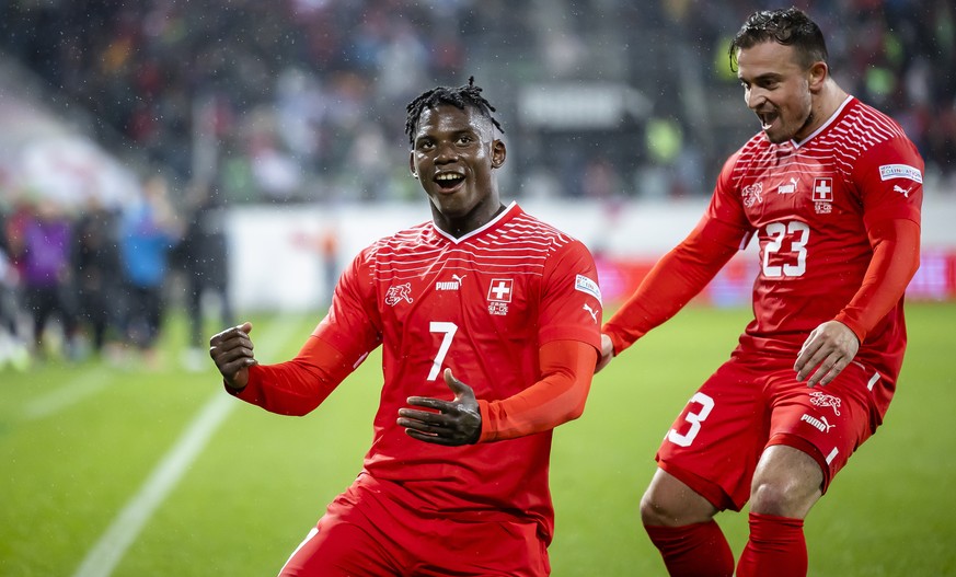 epa10210549 Switzerland's Breel Embolo (L) celebrates with teammate Xherdan Shaqiri (R) after scoring the 2-0 lead during the UEFA Nations League soccer match between Switzerland and the Czech Republi ...