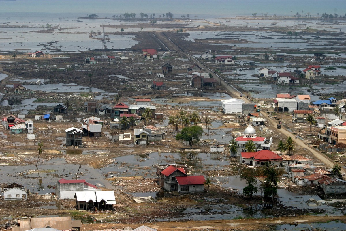 epa11790696 (FILE) - An aerial photo taken from a helicopter shows devastation after tsunami waves in Lam Dingin area, Banda Aceh, Indonesia, 17 March 2005 (reissued 23 December 2024). December 2024 m ...