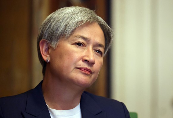 epa13030879 Australian Foreign Secretary Penny Wong speaks with Ukraine's First Lady Olena Zelenska (not pictured) via video link during talks with the British and Australian foreign secretaries  ...