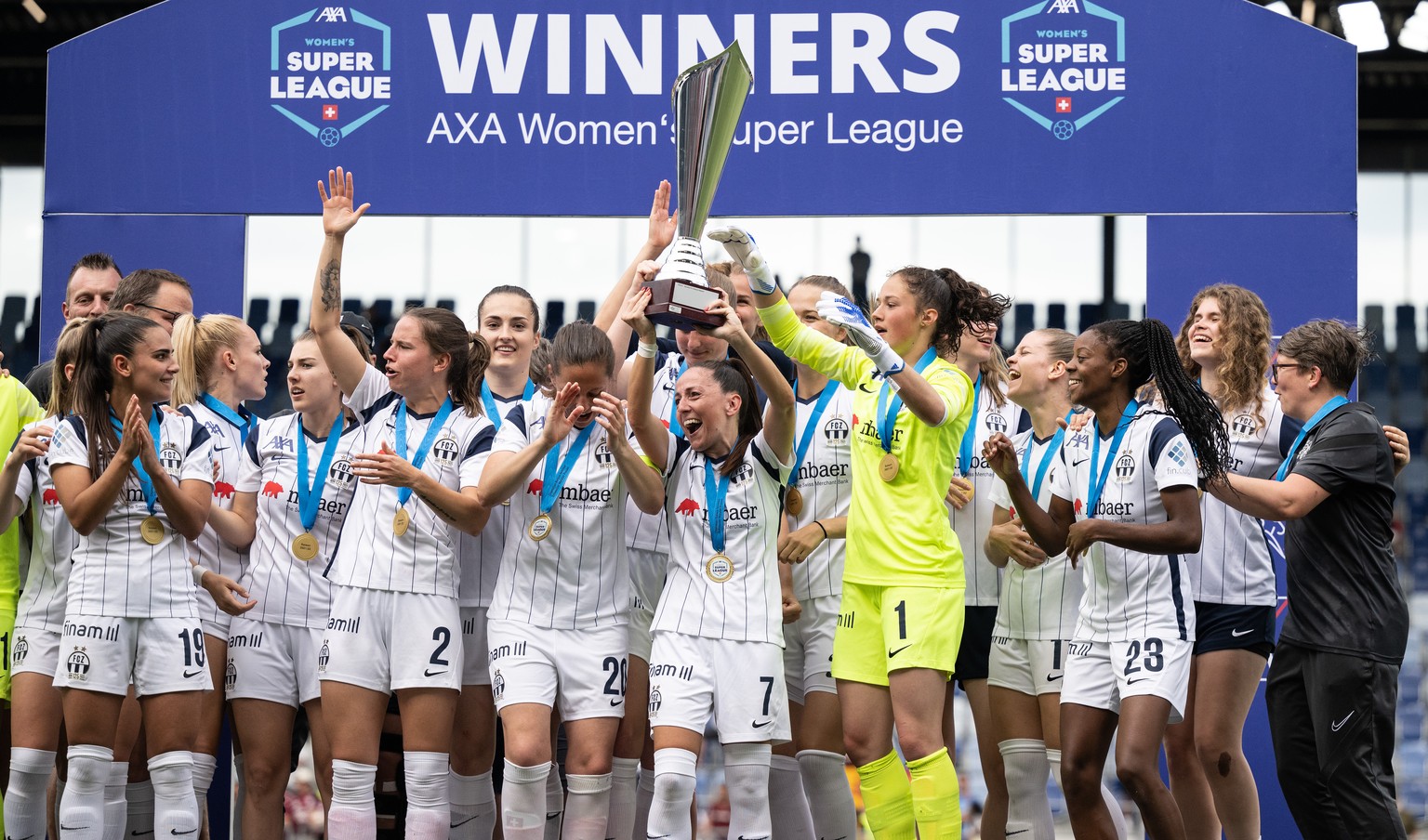 Zuerichs player celebrate with the trophy during the Women