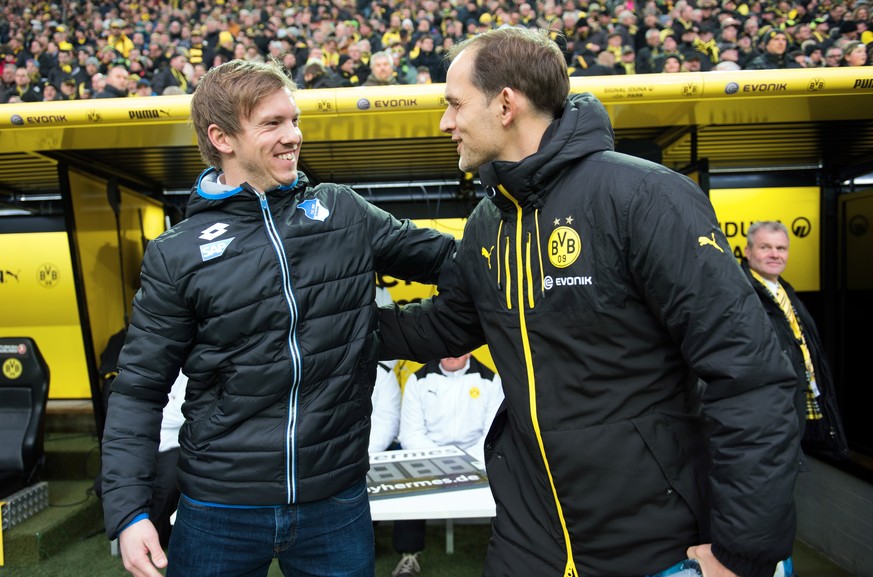 ARCHIV - 28.02.2016, Nordrhein-Westfalen, Dortmund: Fu�ball Bundesliga, Borussia Dortmund - 1899 Hoffenheim, 23. Spieltag, Signal Iduna Park. Dortmunds Trainer Thomas Tuchel (r) und Trainer Julian Nag ...