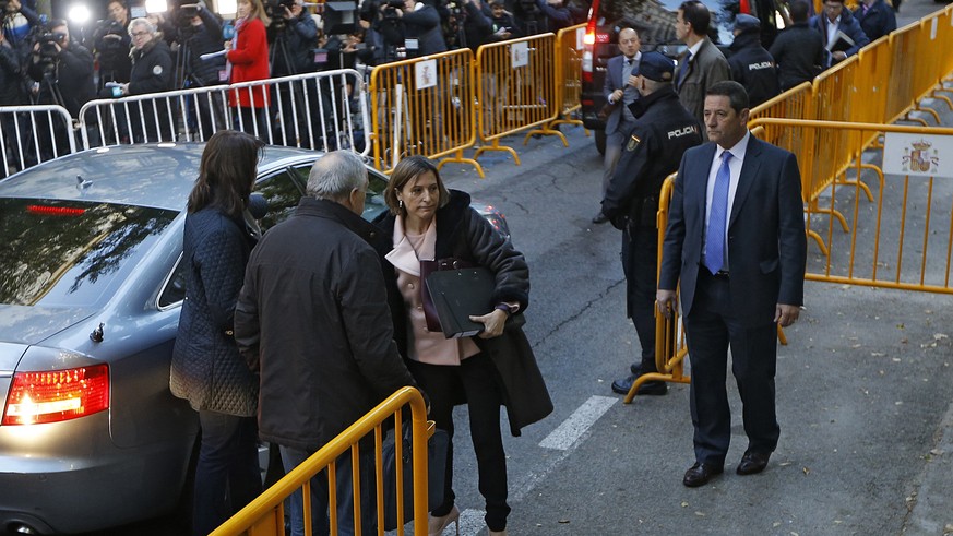 Ex-speaker of the Catalonia parliament Carme Forcadell, center, arrives at the Supreme Court in Madrid, Thursday, Nov. 9, 2017. Six Catalan lawmakers are testifying Thursday before a Spanish judge ove ...