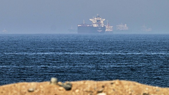 FILE - Cargo ships are seen at sea near the Strait of Hormuz, as viewed from a rocky shoreline near Khor Fakkan, United Arab Emirates, Friday, May 1, 2026. (AP Photo/Fatima Shbair, File)
Strait of Hor ...