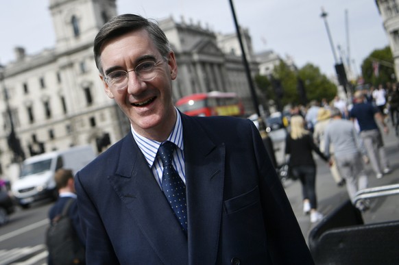 epa07010763 Conservative MP Jacob Rees-Mogg arrives at the Palace of Westminster in London, Britain, 10 September 2018. EPA/NEIL HALL