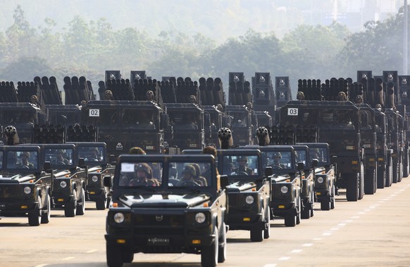 FILE - Myanmar military officers leave the venue during a parade to commemorate Myanmar&#039;s 78th Armed Forces Day in Naypyitaw, Myanmar, Monday, March 27, 2023. Myanmar?s military government is urg ...