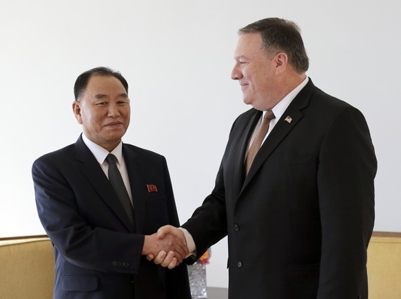 Kim Yong Chol, former North Korean military intelligence chief and one of Kim Jong Un&#039;s closest aides, left, and U.S. Secretary of State Mike Pompeo pose for a picture before a meeting, Thursday, ...