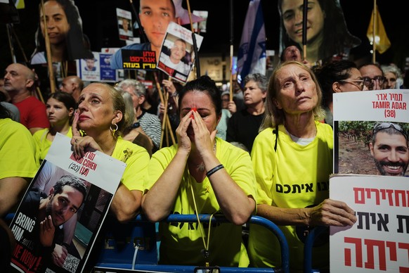 Relatives and supporters of Israeli hostages held in the Gaza Strip attend a rally demanding their release from Hamas captivity and calling for an end to the war, in Tel Aviv, Israel, Saturday, Sept.  ...