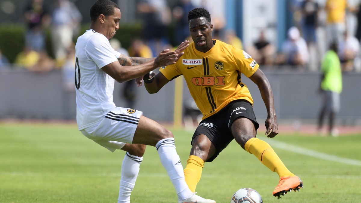 Wolverhampton Wanderers Helder Costa, left, fights against YBs Ulisses Garcia, right, during a friendly soccer match of the international Uhrencup tournament between Switzerland's BSC Young Boys  ...