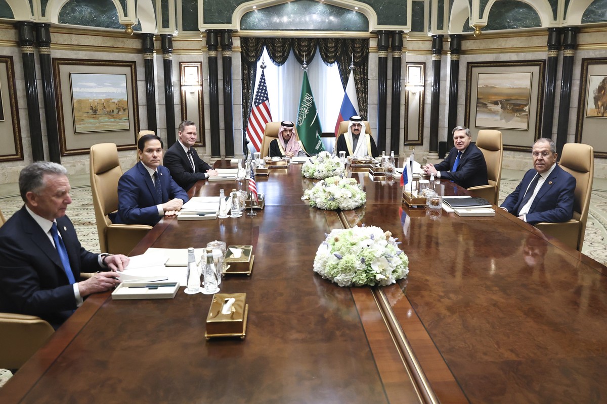 epa11905023 A handout photo made available by the Russian Foreign Ministry Press Service shows Russian Foreign Minister Sergey Lavrov (R) and Russian presidential aide Yury Ushakov (2-R) attending a m ...