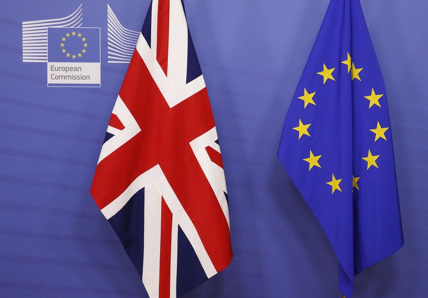 epa07186750 A British (L) and European Union flag are set up before British Prime Minister Teresa May and European Commission President Jean-Claude Juncker are to meet at the EU Commission headquarter ...