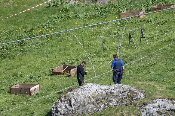 The accident site closed off by the police after an accident during the inspection of the Titlis cable car between Engelberg and Stand, on Wednesday, June 5, 2019, in Engelberg, Switzerland. (KEYSTONE ...