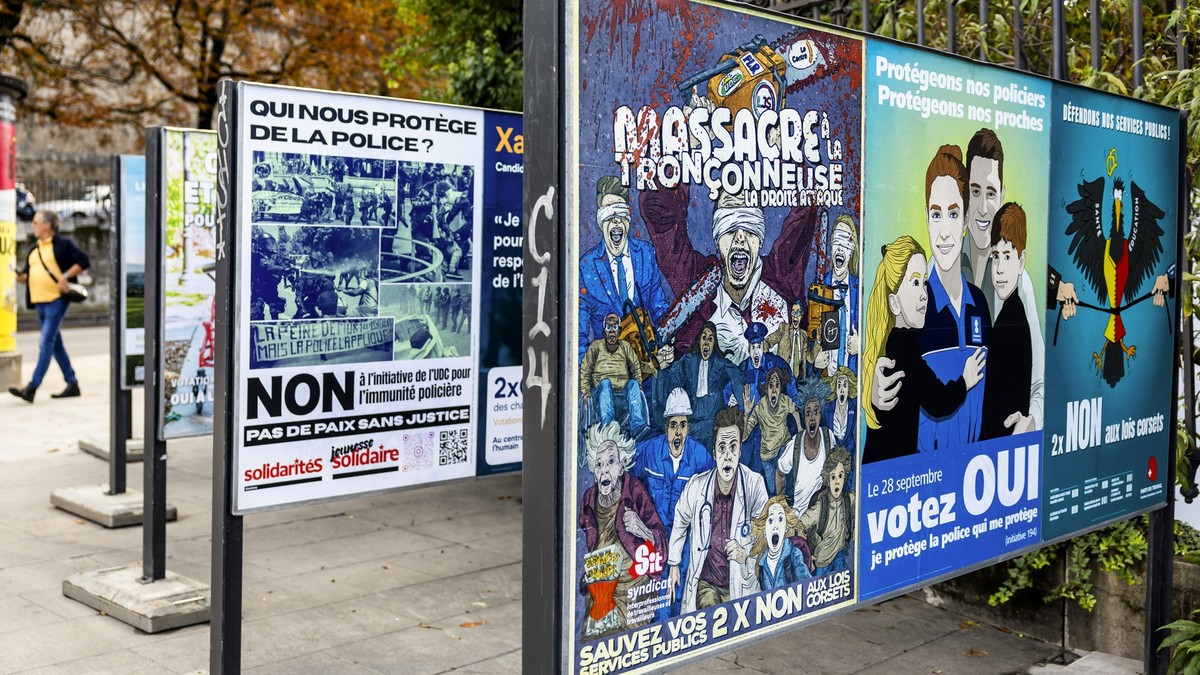 Votations 28 septembre 2025: les résultats à Genève. Une personne passe vers les affiches des partis politiques et des associations donnant leurs mots d'ordre pour les votations cantonales, feder ...