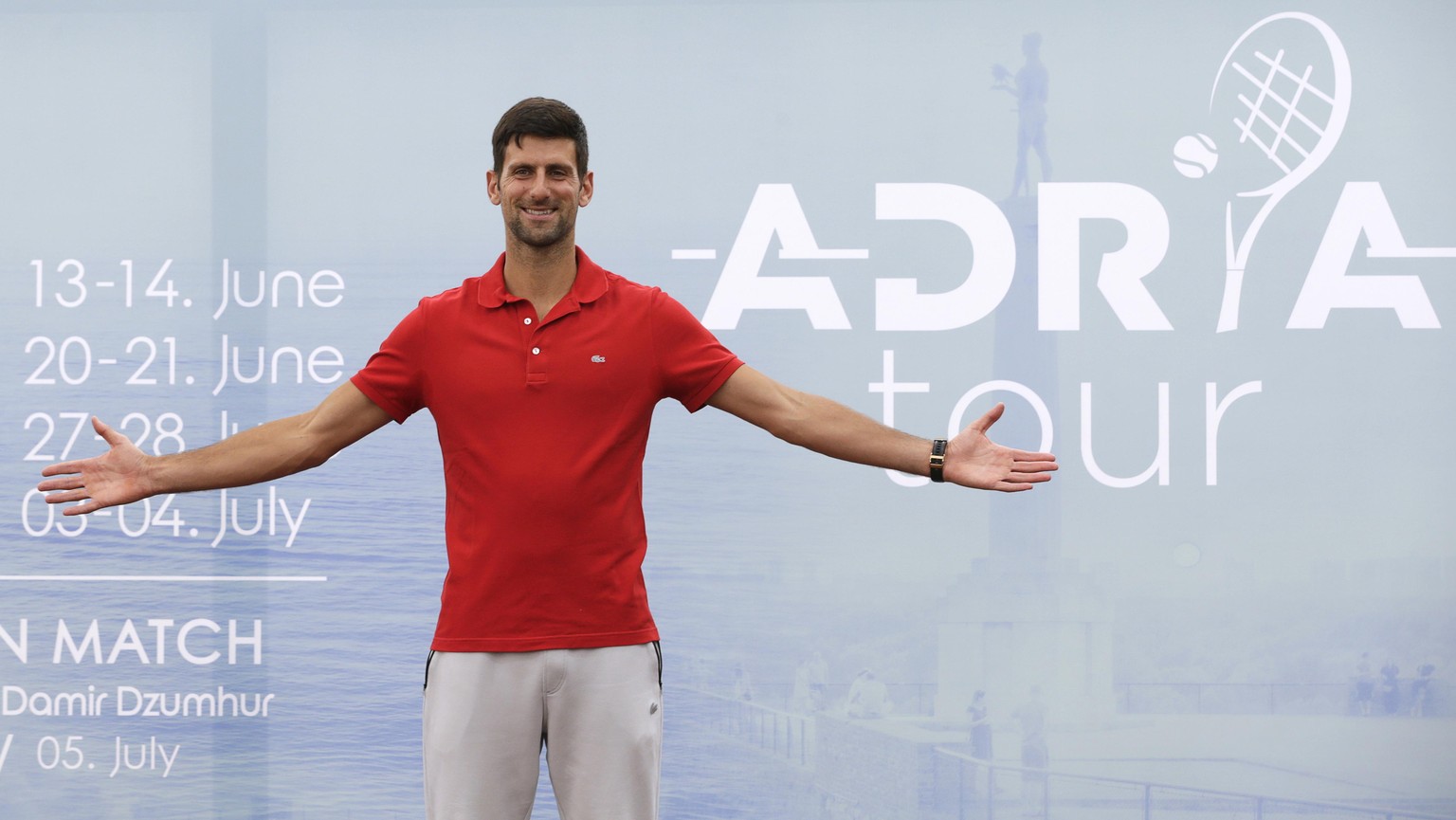 epa08443514 Serbian tennis player Novak Djokovic poses for photographers during a press conference on the upcoming Adria Tour tennis tournament in Belgrade, Serbia, 25 May 2020. Novak Djokovic present ...