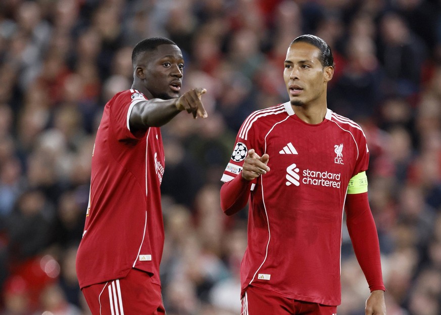 Liverpool FC v Atletico de Madrid - UEFA Champions League 2025/26 League Phase MD1 Ibrahima Konate and Virgil van Dijk of Liverpool on the pitch during the UEFA Champions League 2025/26 League Phase M ...