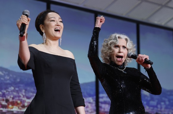 epa12951083 Gong Li (L) and Jane Fonda speak during the opening ceremony of the 79th annual Cannes Film Festival, in Cannes, France, 12 May 2026. The film festival runs from 12 to 23 May 2026. EPA/SEB ...
