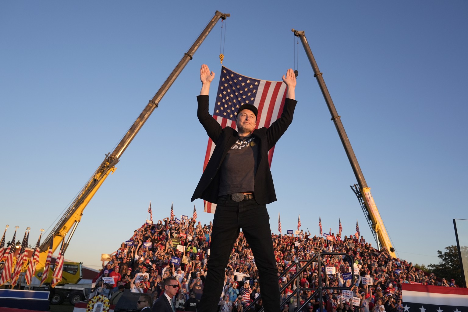 FILE - Tesla and SpaceX CEO Elon Musk walks to the stage to speak alongside Republican presidential nominee former President Donald Trump at a campaign event at the Butler Farm Show, Saturday, Oct. 5, ...