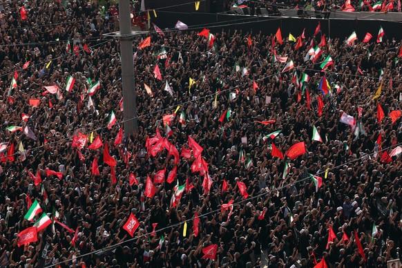 epa13085133 Iranians pay tribute to the late Iranian supreme leader Ayatollah Ali Khamenei during a farewell ceremony ahead of his funeral at the grand Mosallah mosque in Tehran, Iran, 04 July 2026. I ...