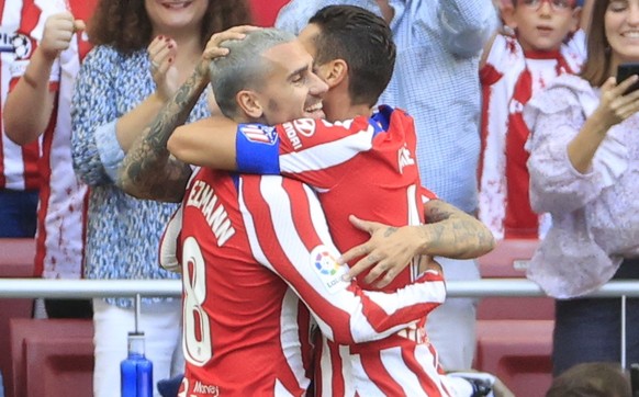 epa10230768 Atletico&#039;s striker Antoine Griezmann (L) and midfielder Koke (R) celebrate the 1-0 goal during the Spanish LaLiga soccer match between Atletico de Madrid and Girona FC at Civitas Metr ...