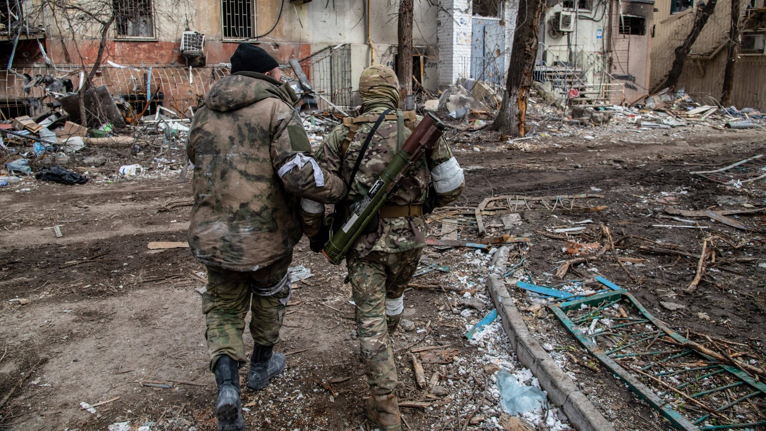 April 16, 2022, Mariupol, Ukraine: Russian and Chechen soldiers in a devastated Mariupol neighborhood, close to the Azovstal front line.  The battle between Russian/Pro-Russian forces and the defending…