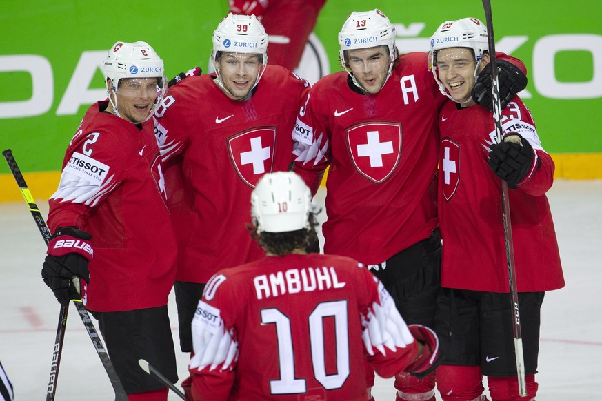 epa09235018 Switzerland&#039;s forward Nico Hischier (2-R) celebrates his goal with teammates during the IIHF 2021 Ice Hockey World Championship Group A game between Switzerland and Russia (ROC), at t ...