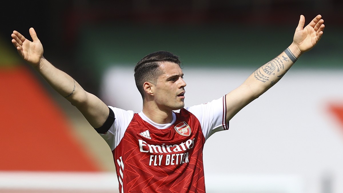 Arsenal's Granit Xhaka reacts during an English Premier League soccer match between Arsenal and Fulham at the Emirates stadium in London, England, Sunday April 18, 2021. (Julian Finney/Pool via A ...