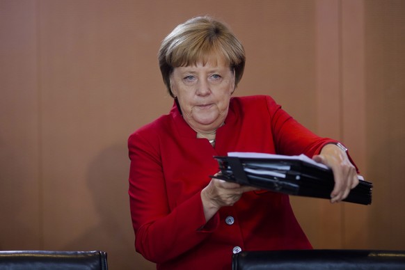 German Chancellor Angela Merkel attends a weekly cabinet meeting of the German government at the chancellery in Berlin, Wednesday, Sept. 28, 2016. (AP Photo/Markus Schreiber)