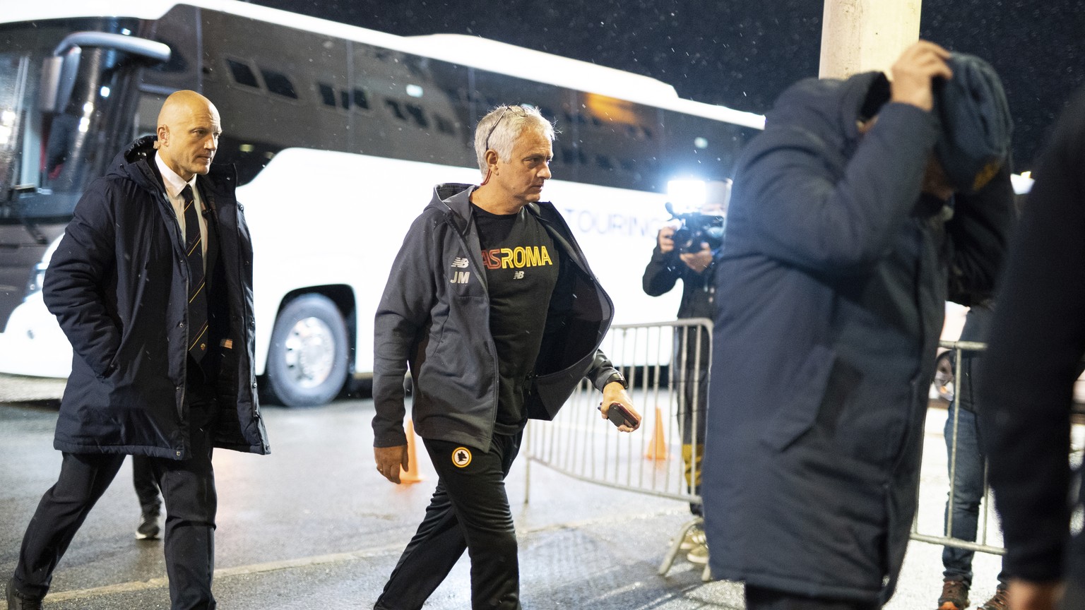 Roma coach Jose Mourinho, center, arrives for a press conference in Bodo, Norway, Wednesday Oct. 20, 2021, ahead of the Europe conference league soccer match between Bodo/Glimt and Roma on Thursday. ( ...