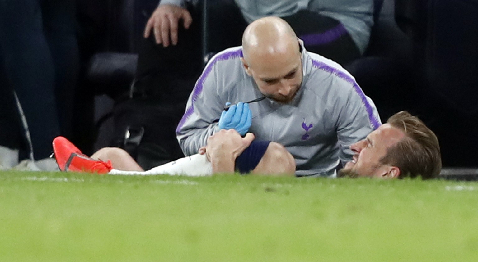 Tottenham's Harry Kane gets injured during the Champions League, round of 8, first-leg soccer match between Tottenham Hotspur and Manchester City at the Tottenham Hotspur stadium in London, Tuesday, A ...