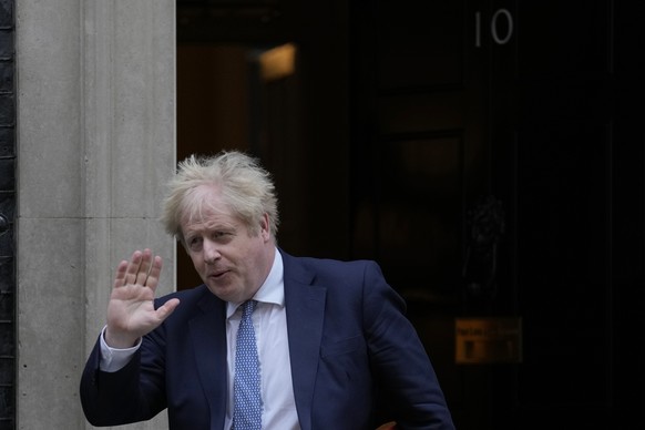 Britain&#039;s Prime Minister Boris Johnson leaves 10 Downing Street for the House of Commons for his weekly Prime Minister&#039;s Questions in London, Wednesday, Feb. 2, 2022. (AP Photo/Alastair Gran ...