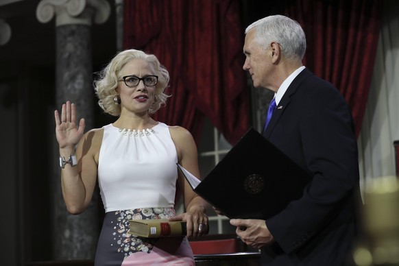 US Senator Kyrsten Sinema, Democrat of Arizona, is sworn in by Vice President Mike Pence on Capitol Hill in Washington, DC on January 3, 2019. US Senator Kyrsten Sinema PUBLICATIONxINxGERxSUIxAUTxONLY ...